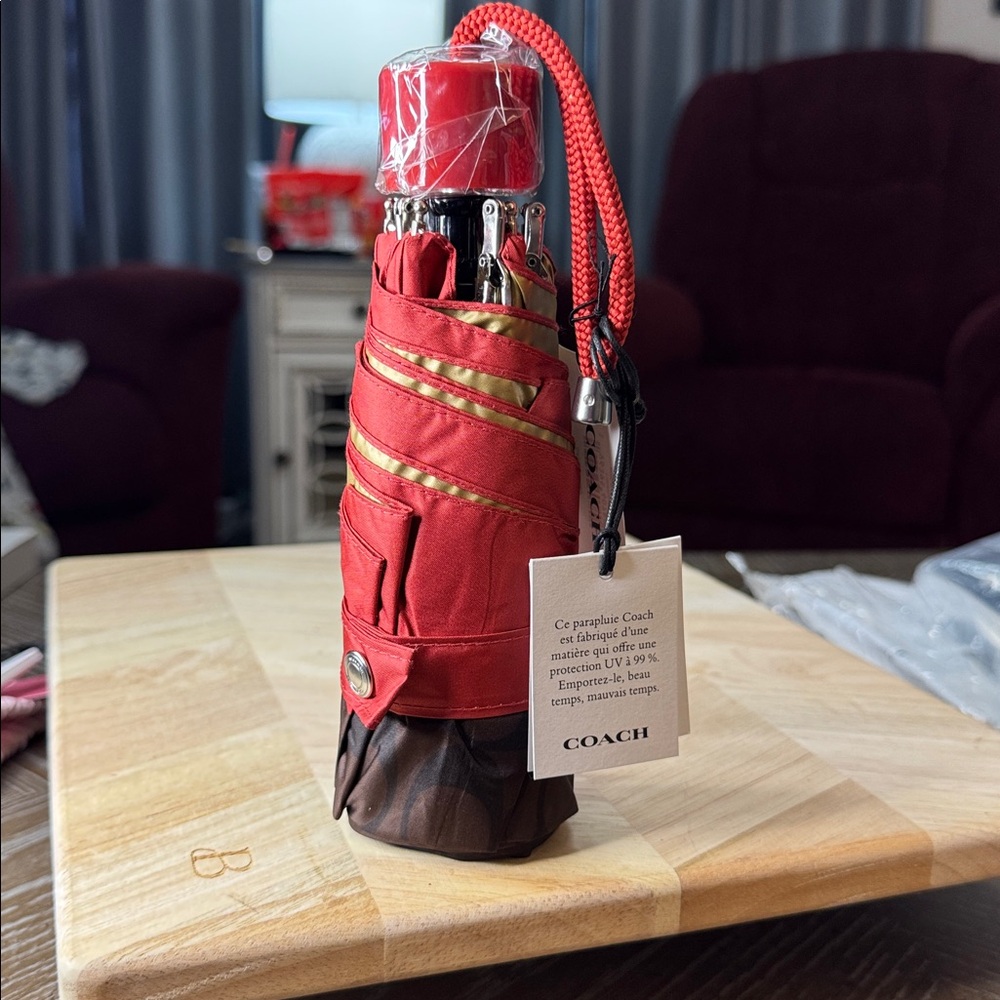Coach Signature Mini Umbrella in red and gold